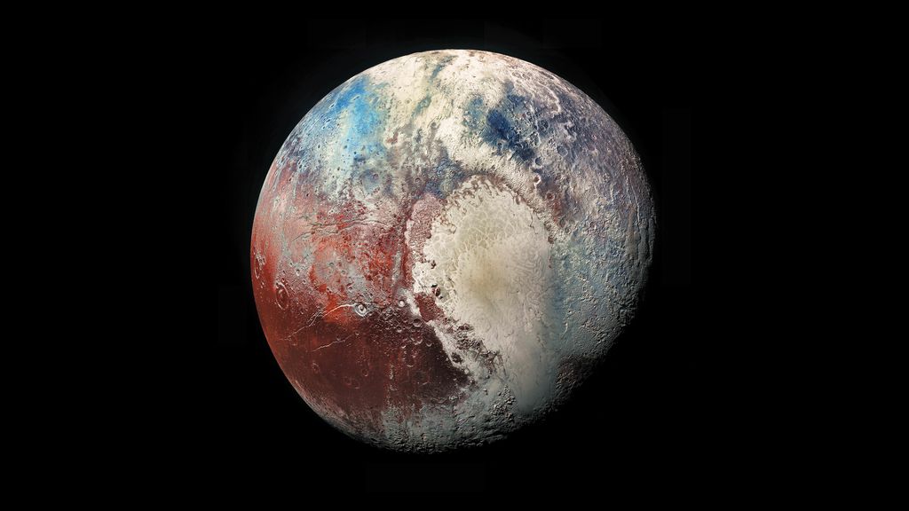 Imagem de Plutão, com uma "mancha" que parece um coração (Foto: NASA)