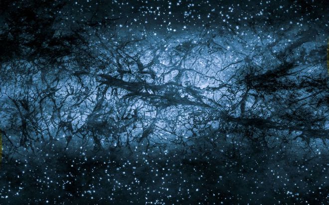 Conceito de como se pareceria a matéria escura, caso pudéssemos vê-la. O áxion é uma das partículas candidatas a compor a matéria invisível (Imagem: Shutterstock)