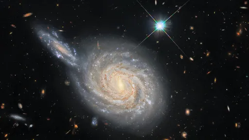 Foto do Hubble mostra duas galáxias espirais em conjunção, não em colisão