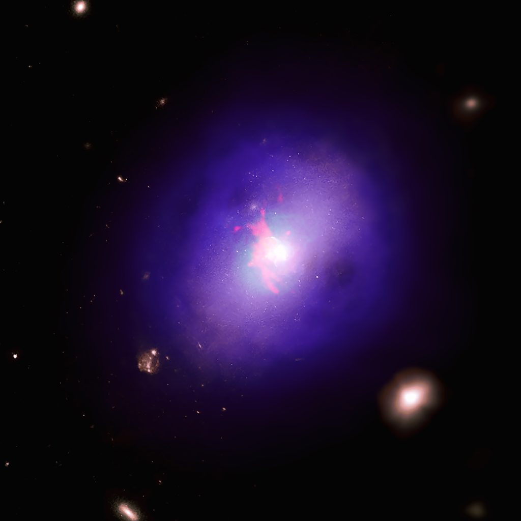 O aglomerado Abell 2597, a um bilhão de anos-luz de nós (Imagem: Reprodução/NASA/CXC/SAO/G. Tremblay et al.; Optical: DSS; H-Alpha: LCO/IMACS/MMTF)