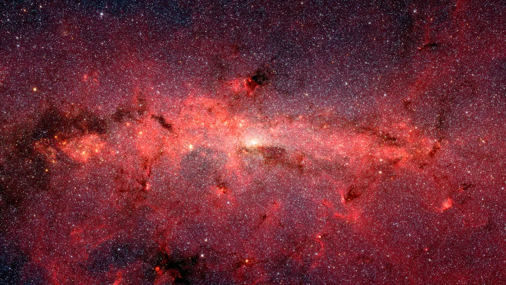 Origem das emissões de raios X foi encontrada entre as constelações de Sagitário, Escudo e a Serpente (Imagem: Reprodução/NASA/JPL-Caltech/S. Solovy (Spitzer Science Center/Caltech)