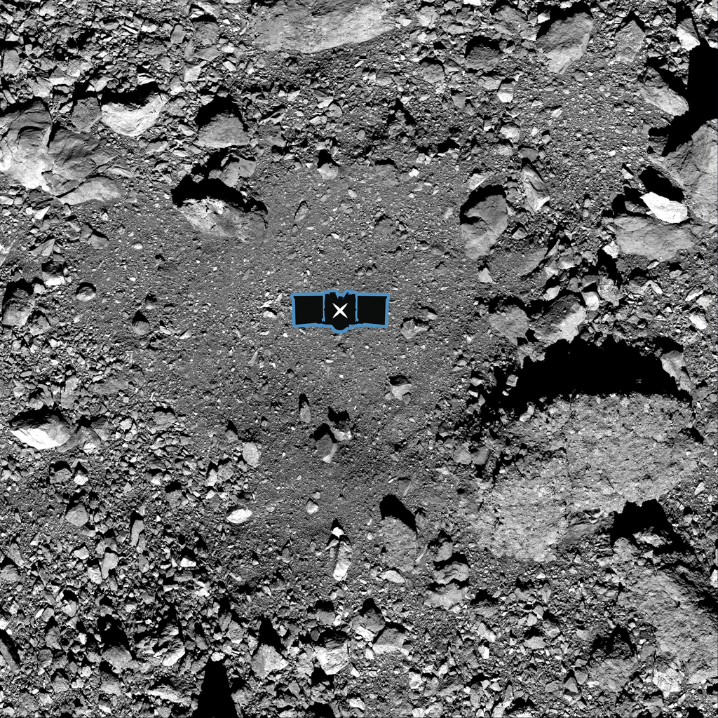 Na imagem, a área Nightingale está assinalada como local de pouso primário da OSIRIS-REx. A imagem também revela o tamanho da sonda em escala na superfície do asteroide (Imagem: NASA/Goddard/University of Arizona)