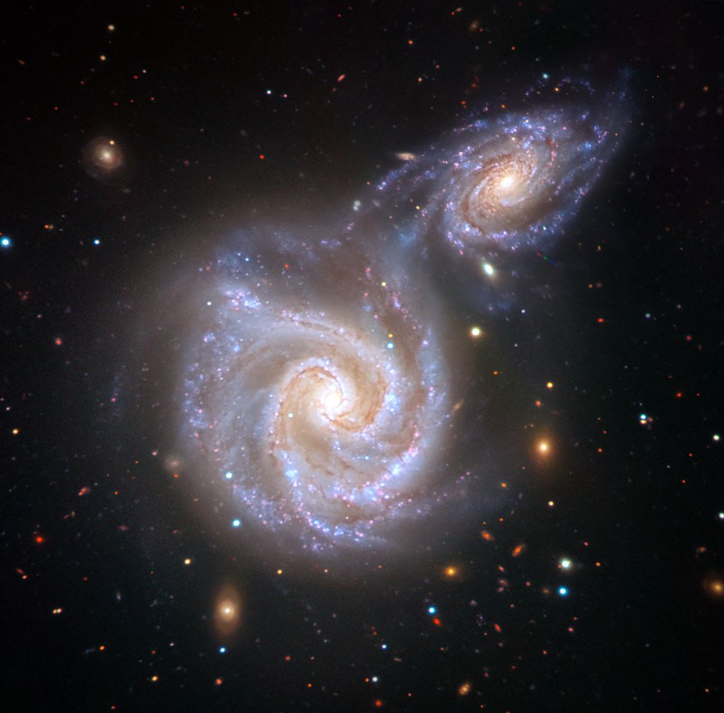 Representação do encontro da Via Láctea com a galáxia satélite, ocorrido há cerca de 10 bilhões de anos (Imagem: Reprodução/V. Belokurov/ESO/Juan Carlos Muñoz)