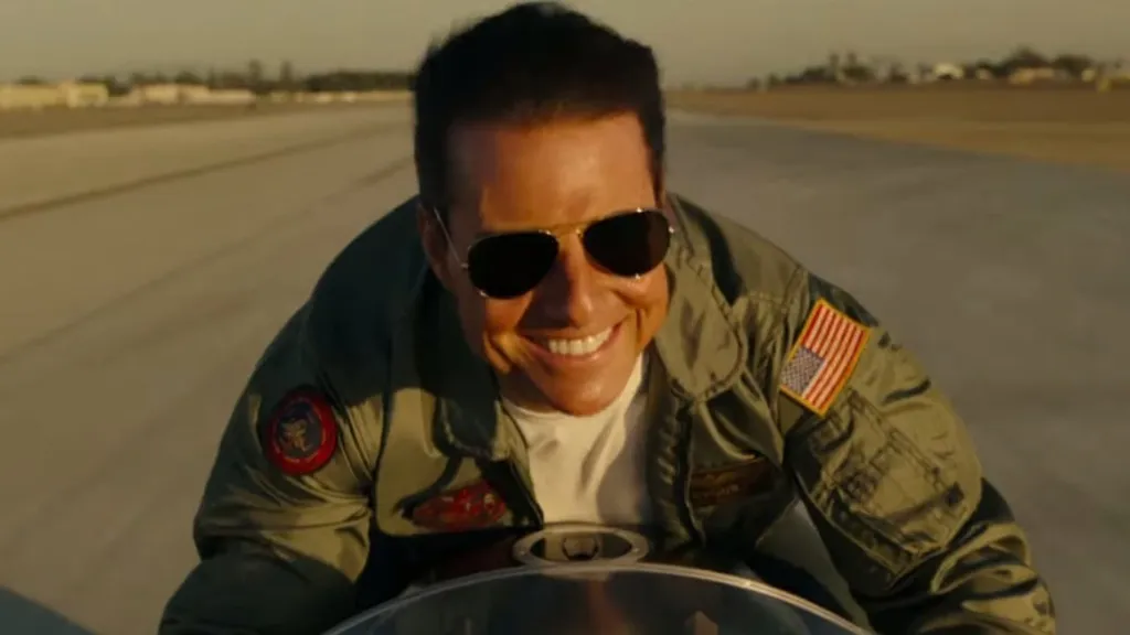 Tom Cruise teve motivos de sobra para sorrir em 2022 (Imagem: Divulgação/Paramount Pictures)