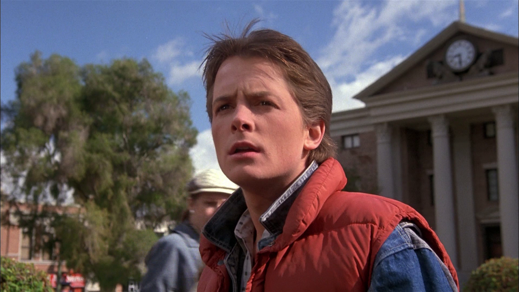 Michael J. Fox interpretou Marty McFly nos três filmes da franquia de viagem no tempo (Imagem: Divulgação / Universal Pictures)