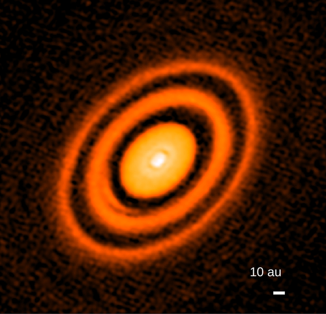 Imagem do telescópio Atacama Large Millimeter/submillimeter Array (ALMA), mostrando anéis ao redor da estrela HD163296 (Imagem: Reprodução/Andrea Isella/Rice University)
