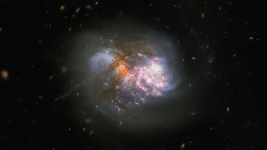 O par de galáxias IC 1623, em processo de colisão (Imagem: Reprodução/ ESA/Hubble & NASA, R. Chandar)