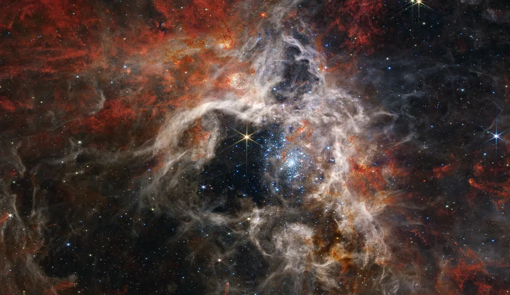 A Nebulosa da Tarântula, um importante objeto de estudo sobre processos de formação estelar (Imagem: Reprodução/NASA, ESA, CSA, STScI, Webb ERO Production Team)