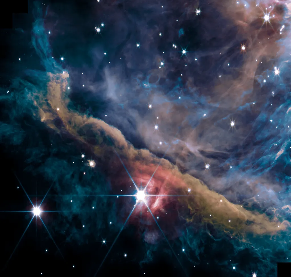 Interior da Nebulosa de Órion, observado pelo telescópio James Webb; note a Barra se estendendo na diagonal (Imagem: Reprodução/NASA, ESA, CSA, PDRs4All ERS Team, S. Fuenmayor & O. Berné)