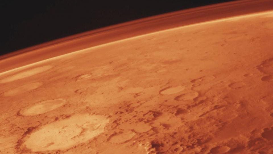 What does the Martian atmosphere say about the evolution of the planet?