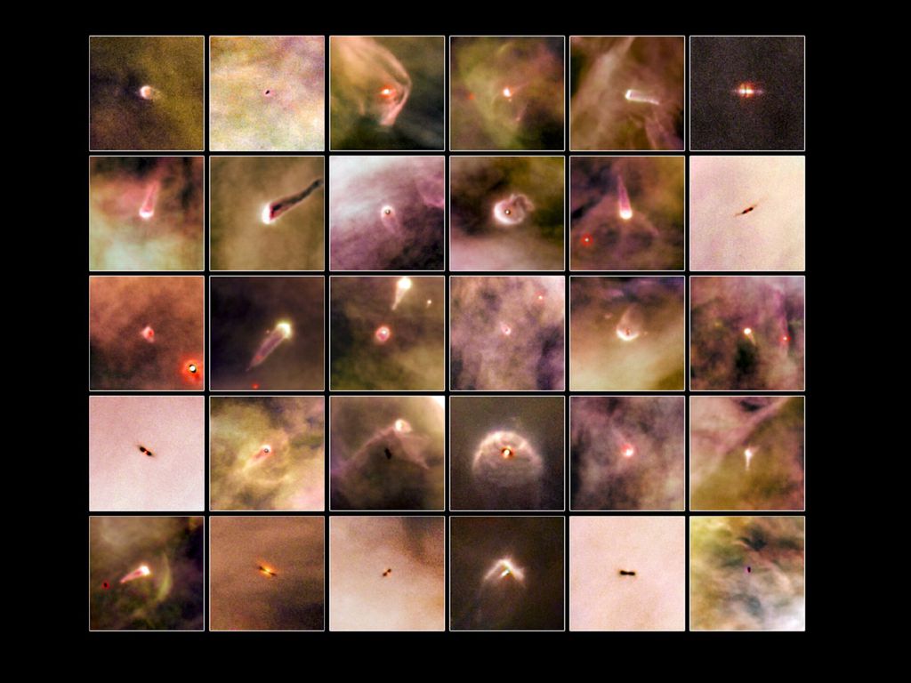 Estrelas recém-nascidas na nebulosa de Órion, envolvidas em "cobertores" de poeira (Imagem: Reprodução/NASA/ESA, L. Ricci (ESO)