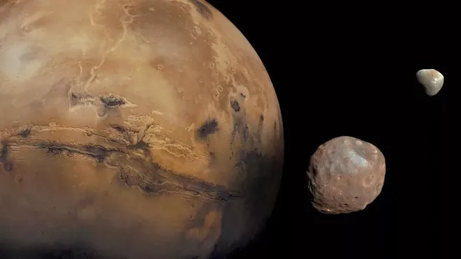 Marte é orbitado pela luas Fobos e Deimos (Imagem: Reprodução/NASA/JPL-CALTECH/GSFC/UNIV. OF ARIZONA)