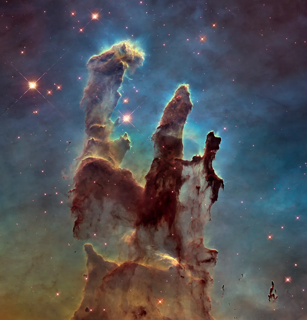 Em 2014, a NASA reprocessou a foto dos Pilares da Criação tirada pelo Hubble em 1995, divulgando este belo registro (Imagem: NASA, ESA/Hubble)