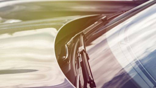 Por que os vidros dos carros têm pontinhos e bordas pretas?