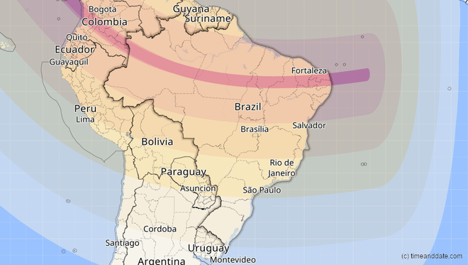 Neste mapa do eclipse solar de 2023 no Brasil, a faixa vermelha corresponde às áreas onde vai ser visto o anel de fogo; quando mais clara a faixa, menor a porcentagem do disco solar coberto pela Lua (Imagem: Reprodução/timeanddate.com)