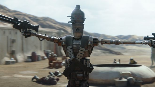 O droide IG-11, dublado por Taika Waititi, é o personagem mais carismático do piloto da série (Imagem: Disney)