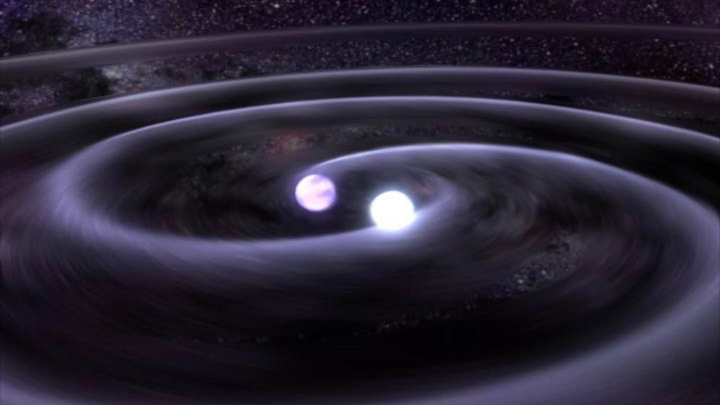 Simulação de ondas gravitacionais produzidas por dois objetos em fusão no centro (Imagem: Reprodução/NASA/Goddard Space Flight Center)