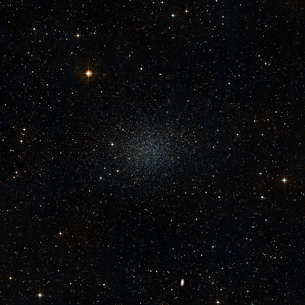 A galáxia do Escultor, onde fica a estrela AS0039 (Imagem: Reprodução/Eso/Digitized Sky Survey 2)