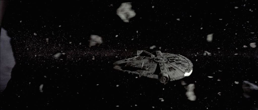 Millenium Falcon passando por um cinturão de asteróides (Imagem: Disney)