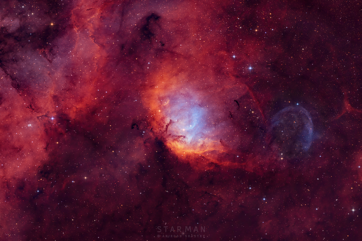 Nebulosa da Tulipa e buraco negro
