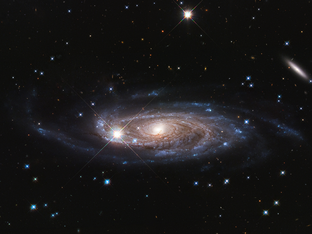 Fotografia da majestosa galáxia espiral UGC 2885, localizada a 232 milhões de anos-luz de distância na constelação de Perseu. A galáxia é 2,5 vezes maior que a nossa Via Láctea e contém 10 vezes mais estrelas (Foto: NASA, ESA and B. Holwerda)