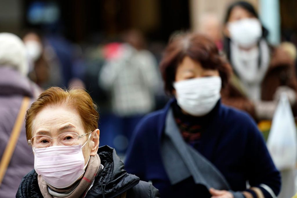 Novos casos do vírus chinês são confirmados nos Estados Unidos e na Austrália (Foto: Eugene Hoshiko/AP Photo)