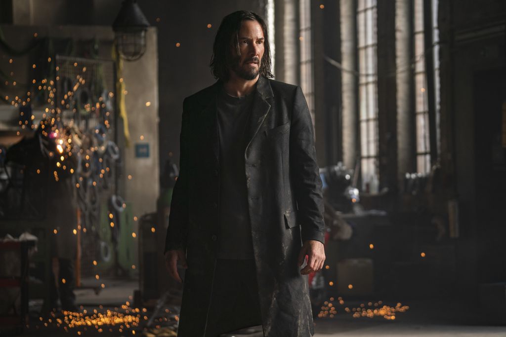 Keanu Reeves quer que você assista Matrix 4, independente da tela (Imagem: Divulgação / Warner Bros.)