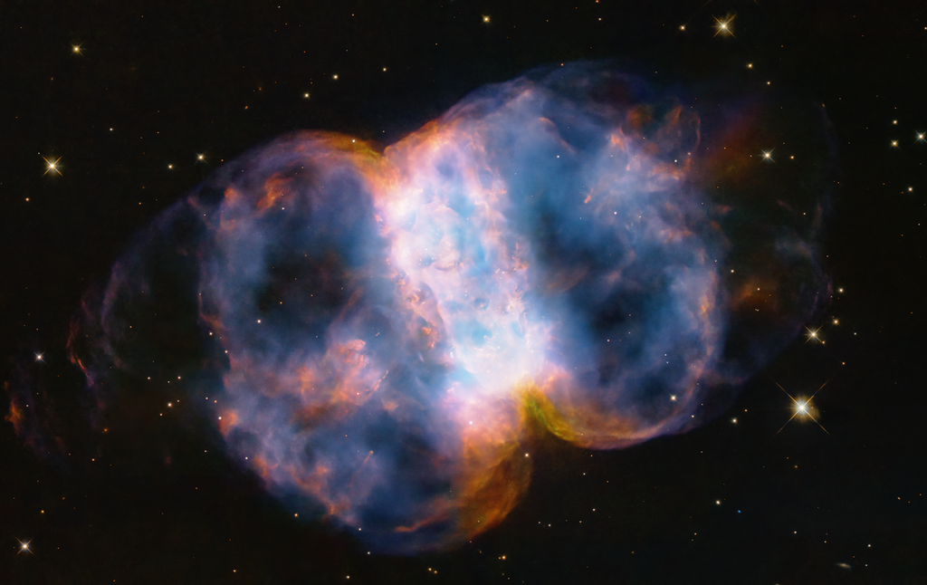 A Pequena Nebulosa do Haltere pelos "olhos" do Hubble (Imagem: Reprodução/NASA, ESA, STScI)