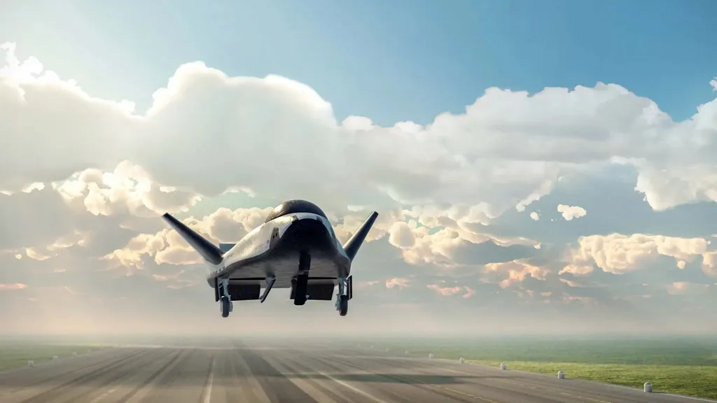 Representação do avião Dream Chaser descendo para pousar em uma pista (Imagem: Reprodução/Sierra Space)