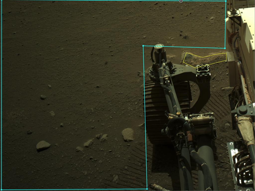 Partes do rover Perseverance visíveis ao lado de uma área destacada no projeto (Imagem: Reprodução/NASA/JPL-Caltech)