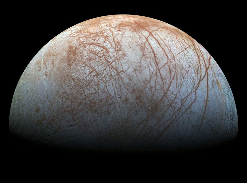 Europa, satélite natural de Júpiter, é um pouco menor que a nossa Lua (Imagem: ReproduçãoNASA, JPL-Caltech, SETI Institute, Cynthia Phillips, Marty Valenti)