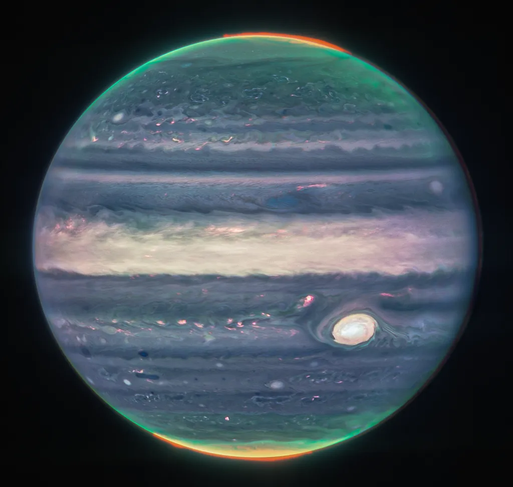 Foto de Júpiter colorida artificialmente para destacar as auroras nos polos e a Grande Mancha Vermelha (Imagem: Reprodução/NASA, ESA, CSA, Jupiter ERS Team/Judy Schmidt)